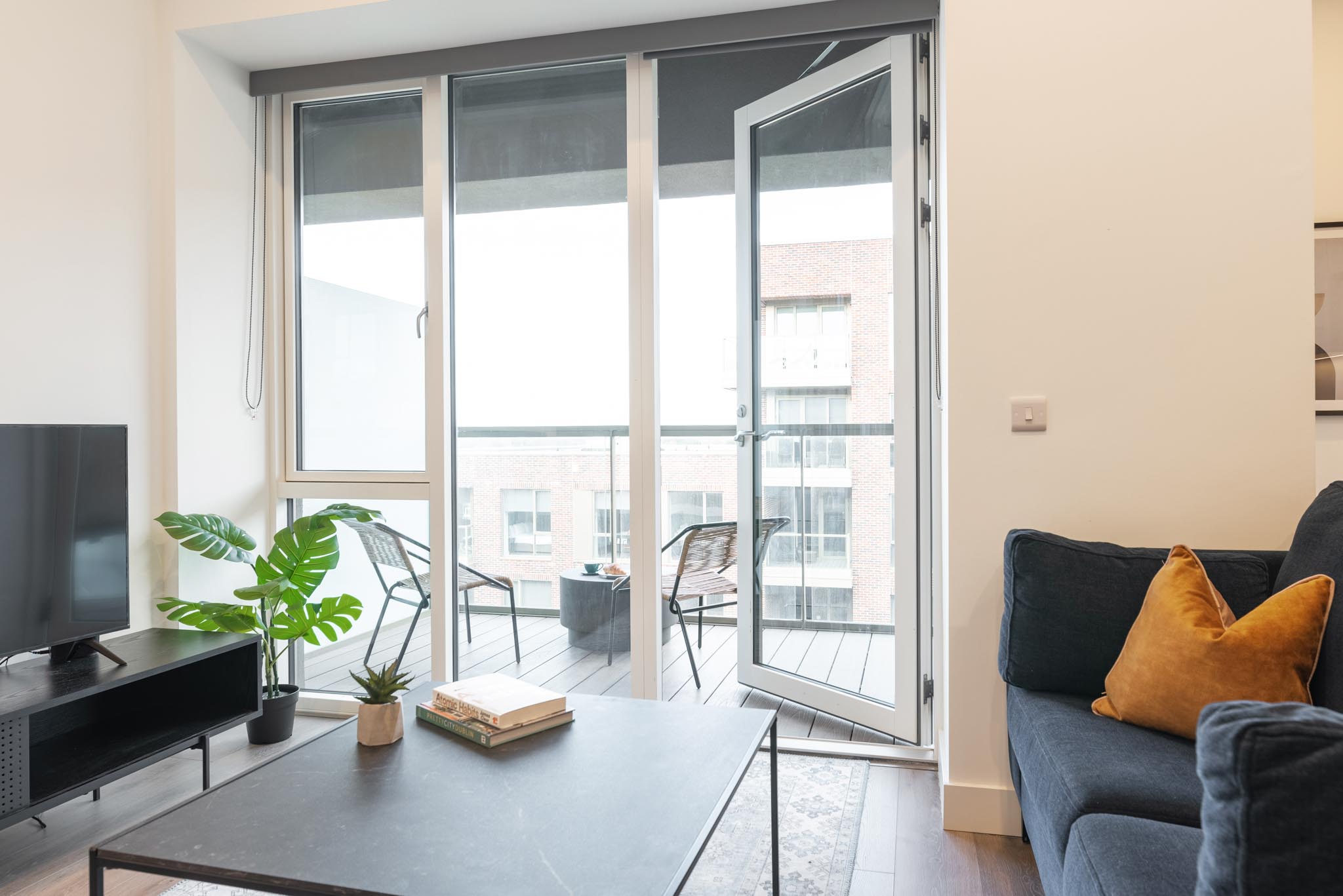 Living Room with balcony - Open Plan One Bedroom Apartment - Urban Rest - Griffith Wood Dublin