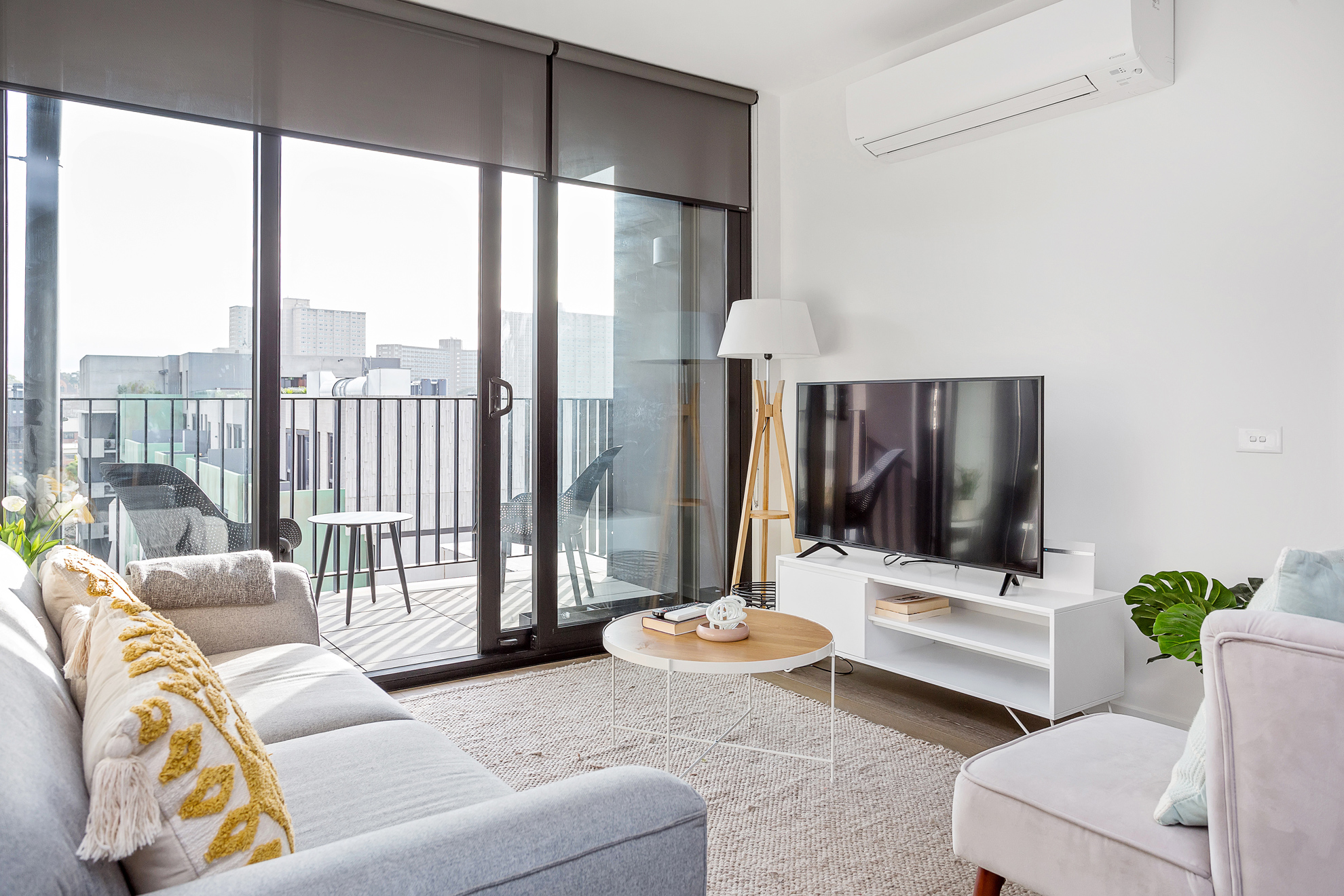 Lounge with a view - Two Bedroom Executive Apartment - Urban Rest- Palmerston Street Apartments Melbourne
