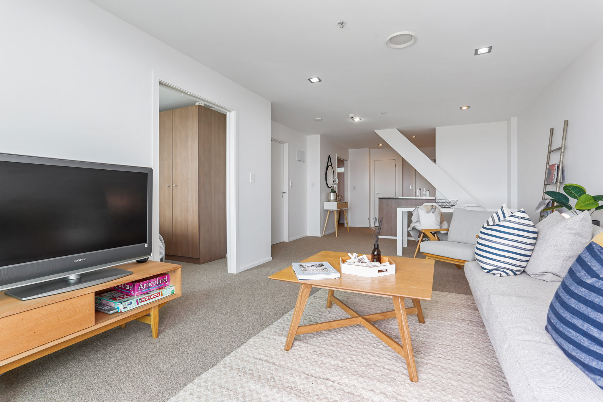 Living Room - Beach Road Apartments by Urban Rest - Auckland, New Zealand