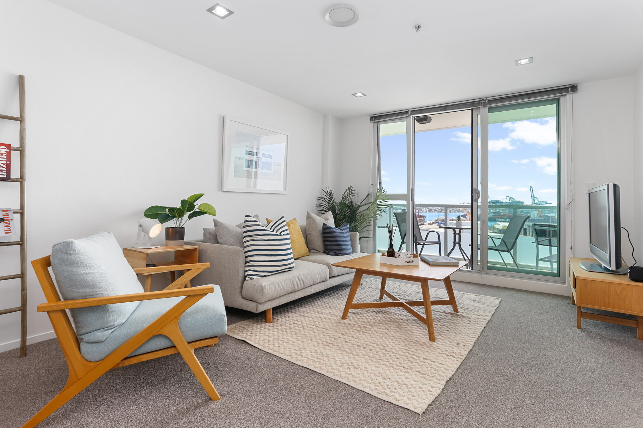 Living Room - Beach Road Apartments by Urban Rest - Auckland, New Zealand
