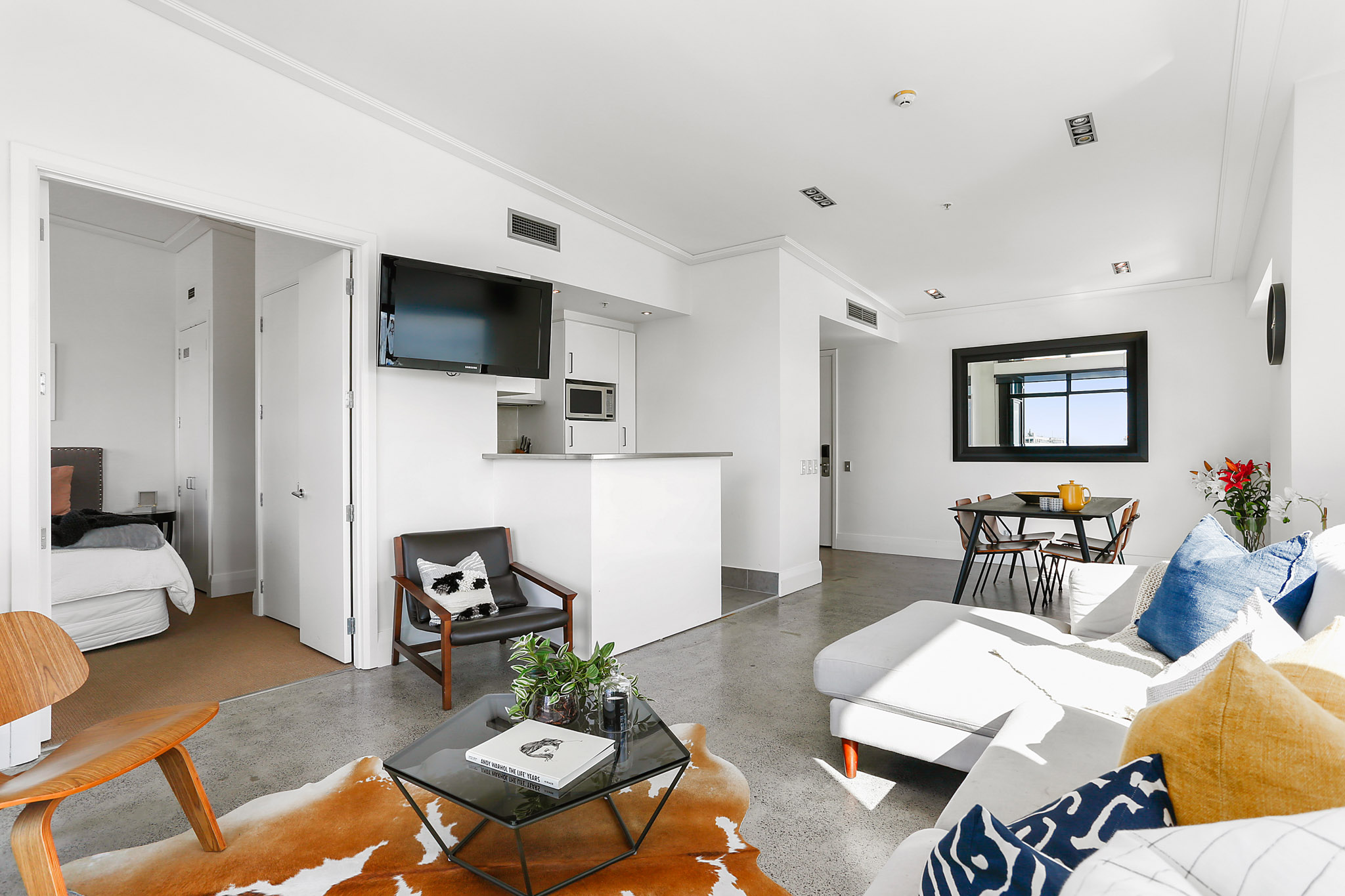 Living Room - Customs Street Apartments by Urban Rest - Auckland, New Zealand