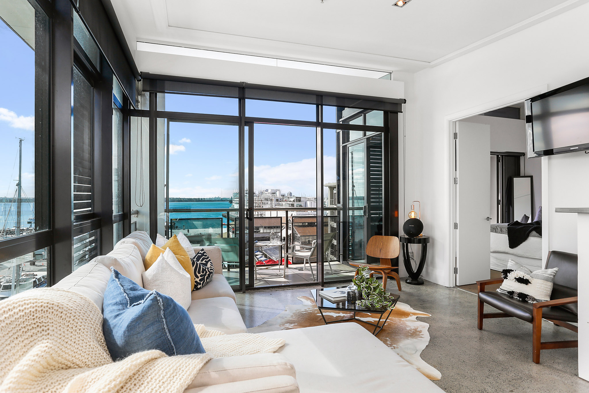 Living Room - Customs Street Apartments by Urban Rest - Auckland, New Zealand