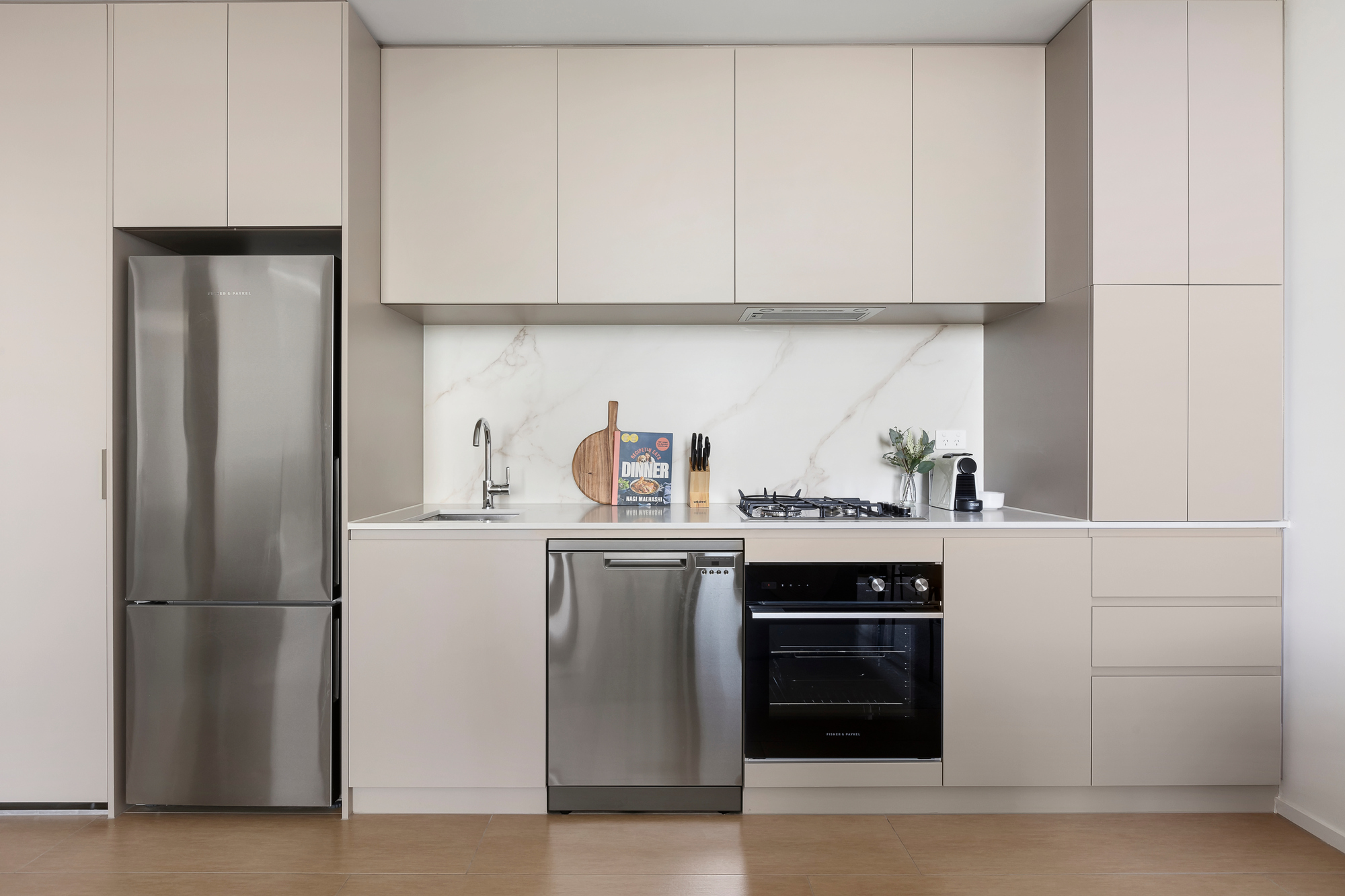 Kitchen in One Bedroom Apartment at Caulfield Apartments by Urban Rest