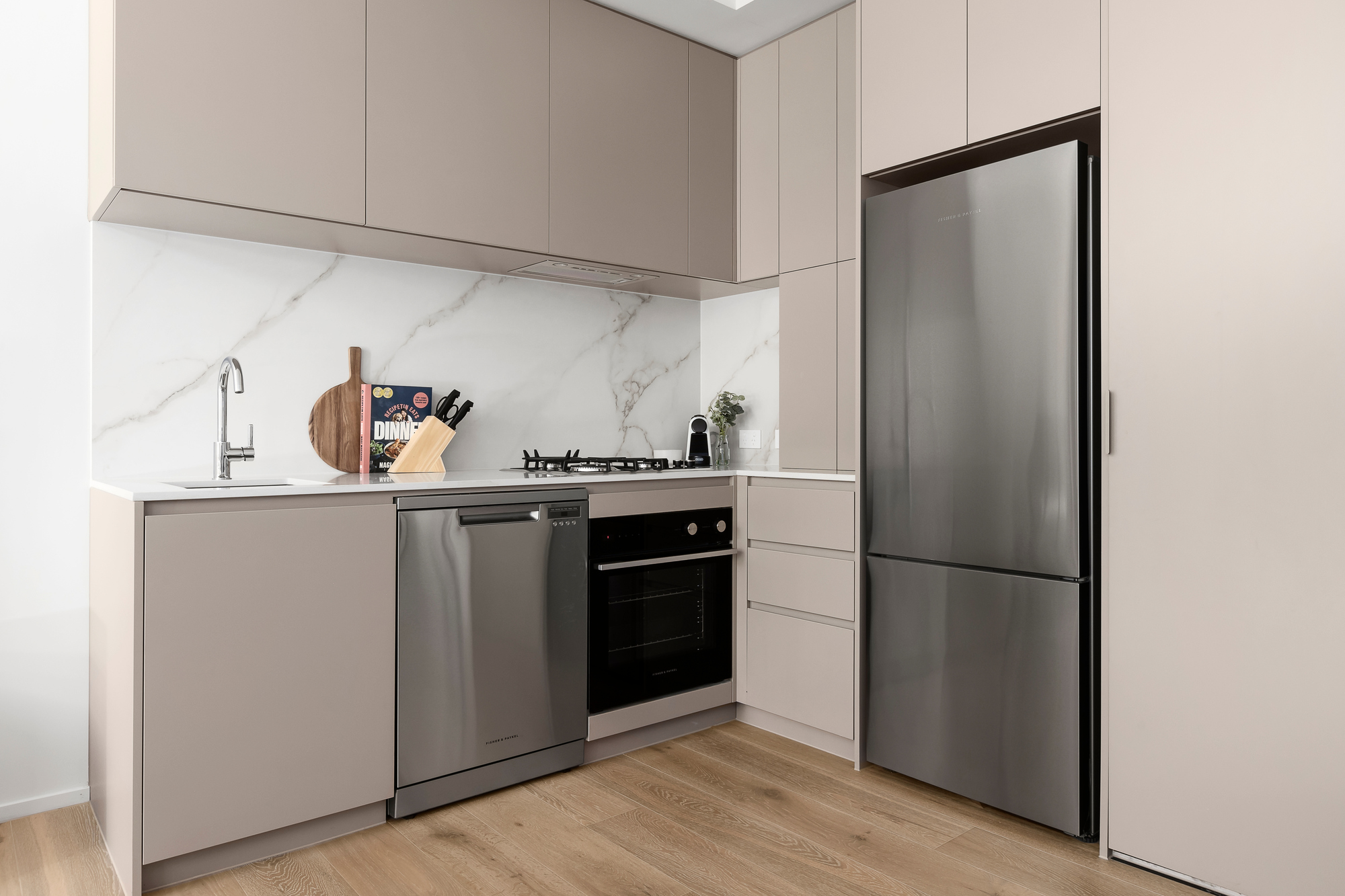 Kitchen in Studio Apartment at Caulfield Apartments by Urban Rest