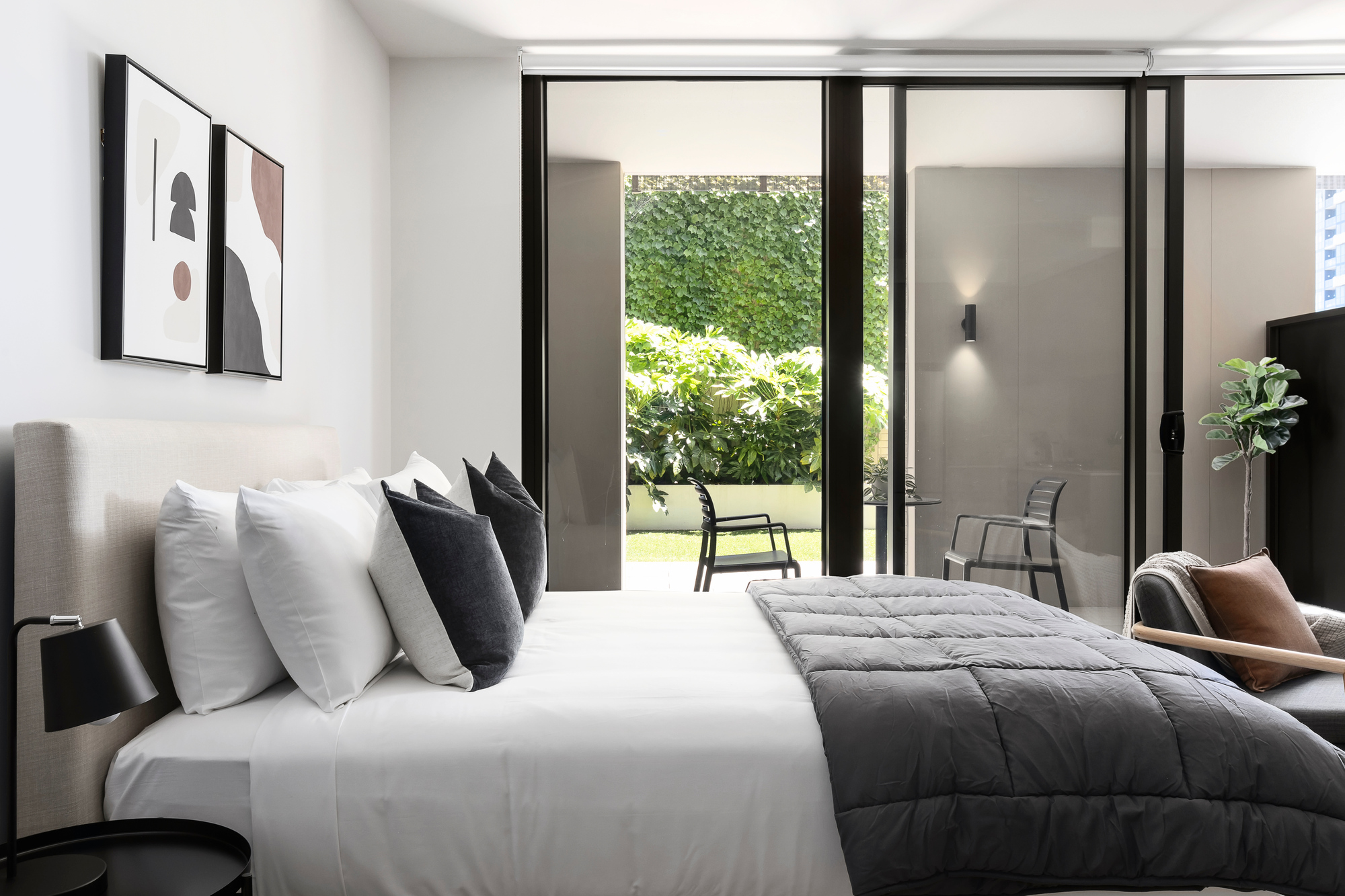 Studio Apartment Bedroom at Caulfield Apartments by Urban Rest