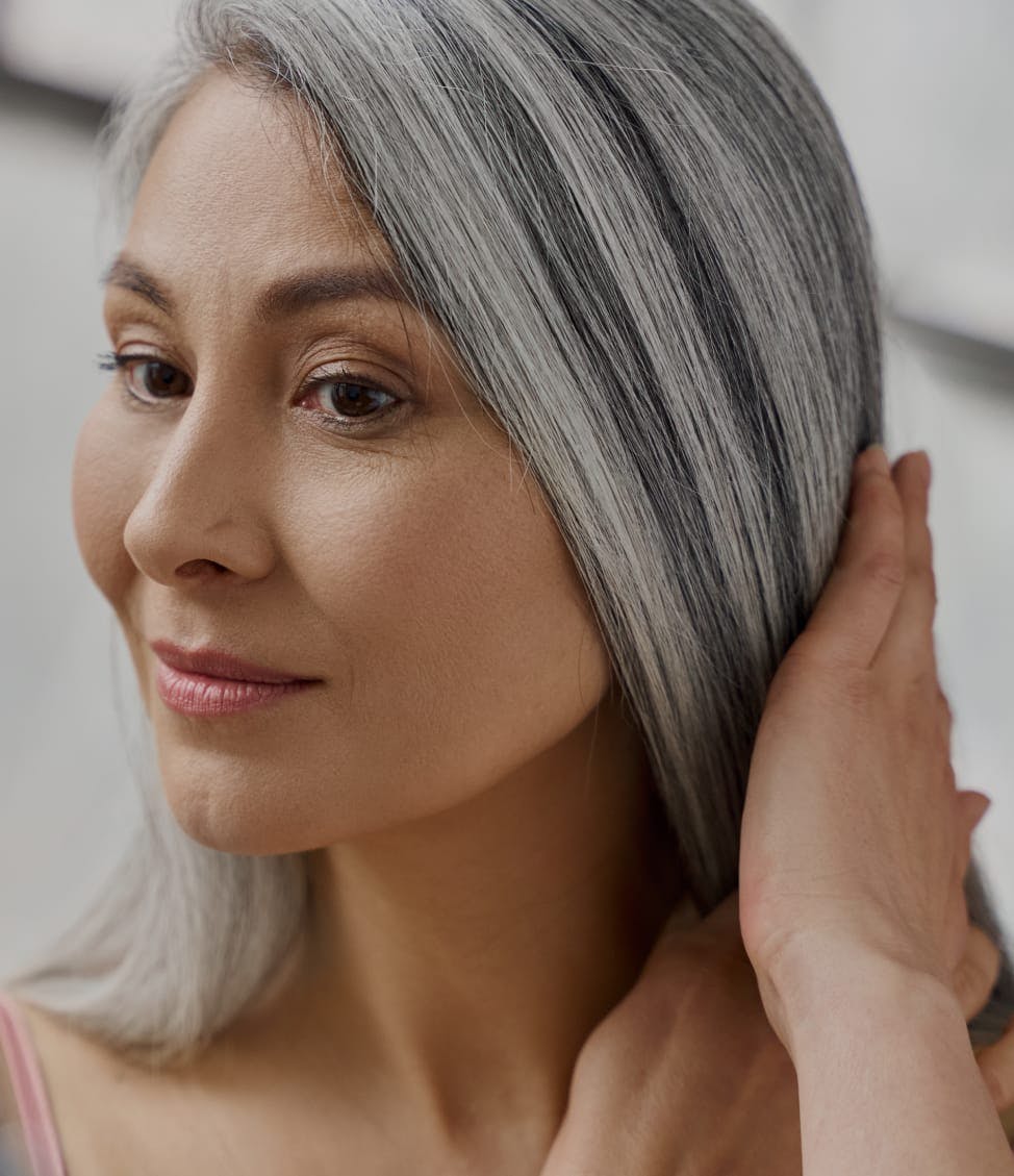 Woman slightly smiling