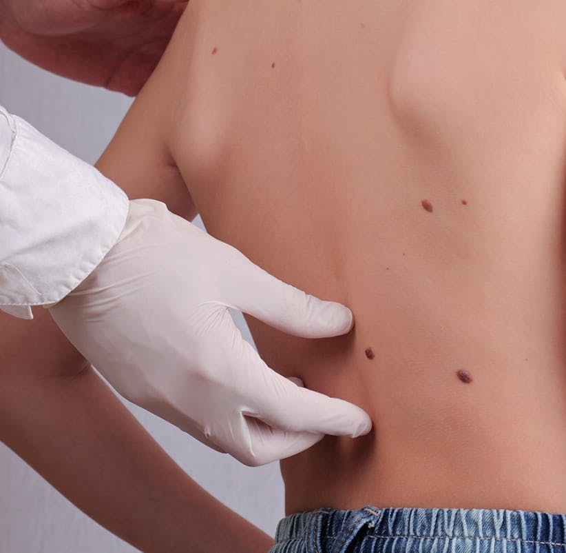 someone is getting examined by a doctor