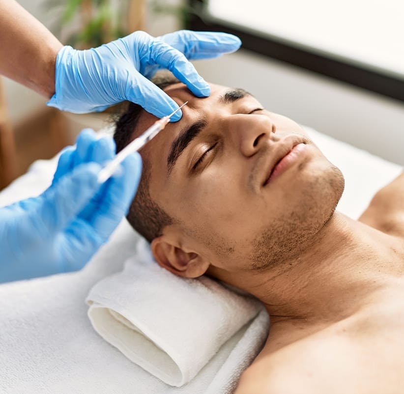 man getting facial treatment