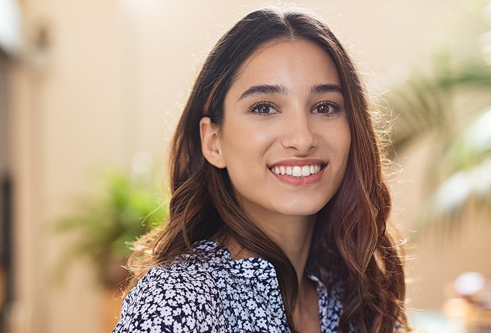 Brunette woman smiling at camera