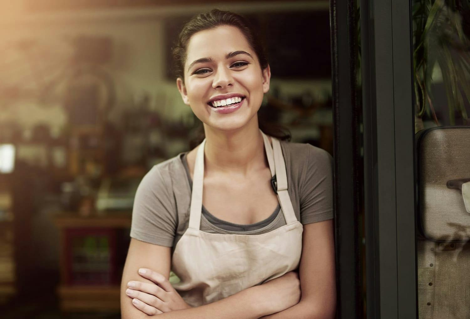 smiling woman in apron