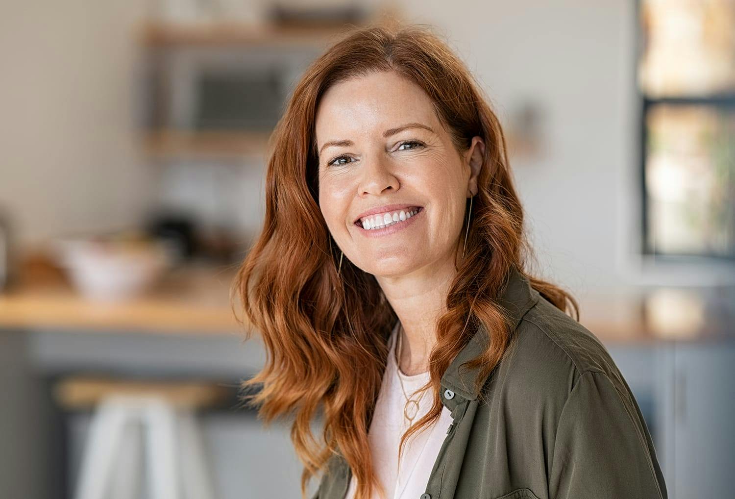 Ginger woman smiling at the camera