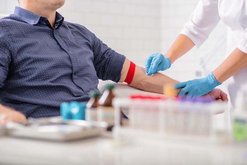 man getting blood work