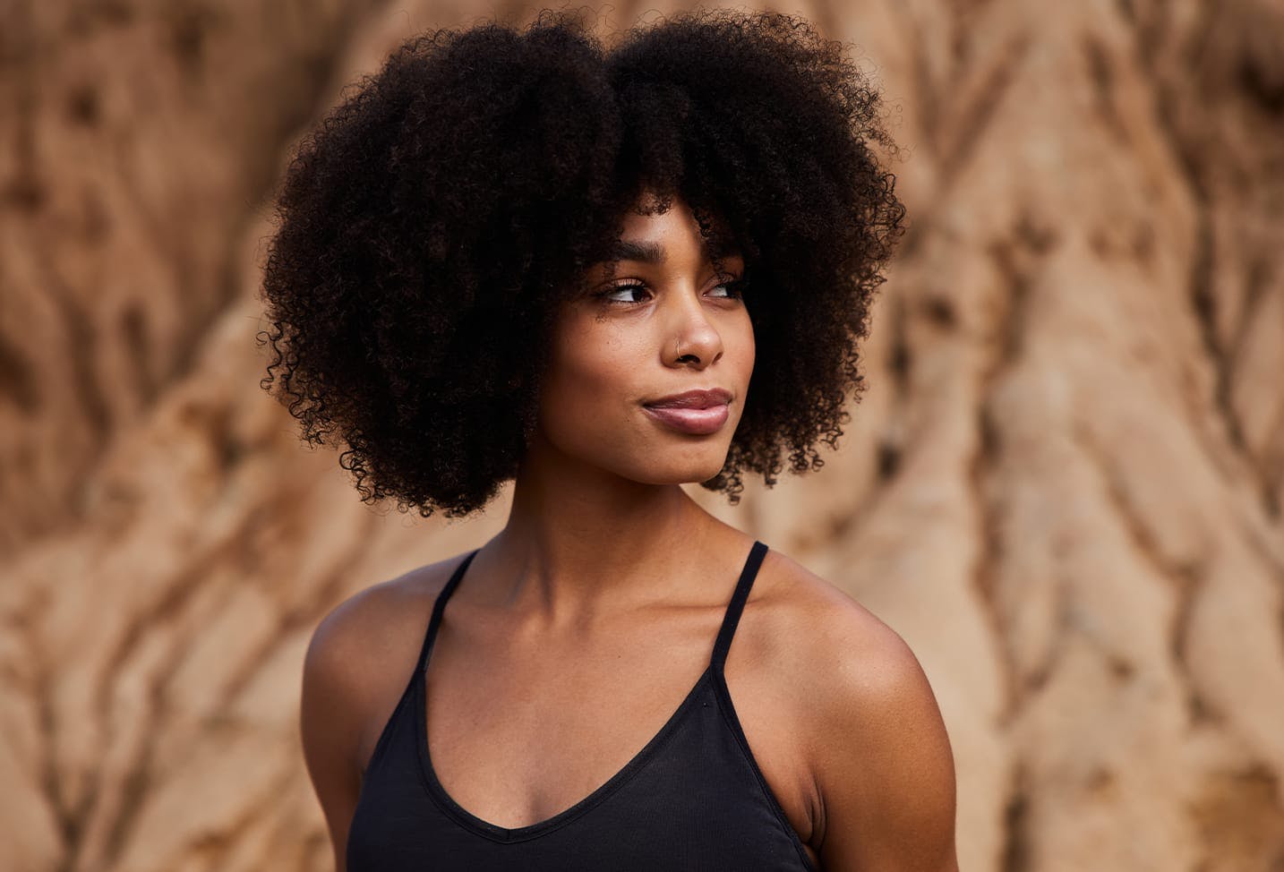 Woman in a black tanktop