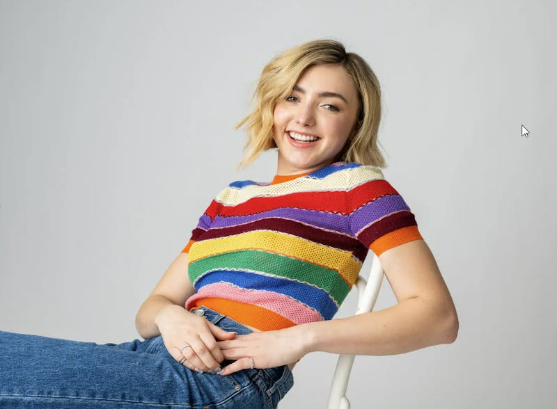 Woman laying down in a striped shirt