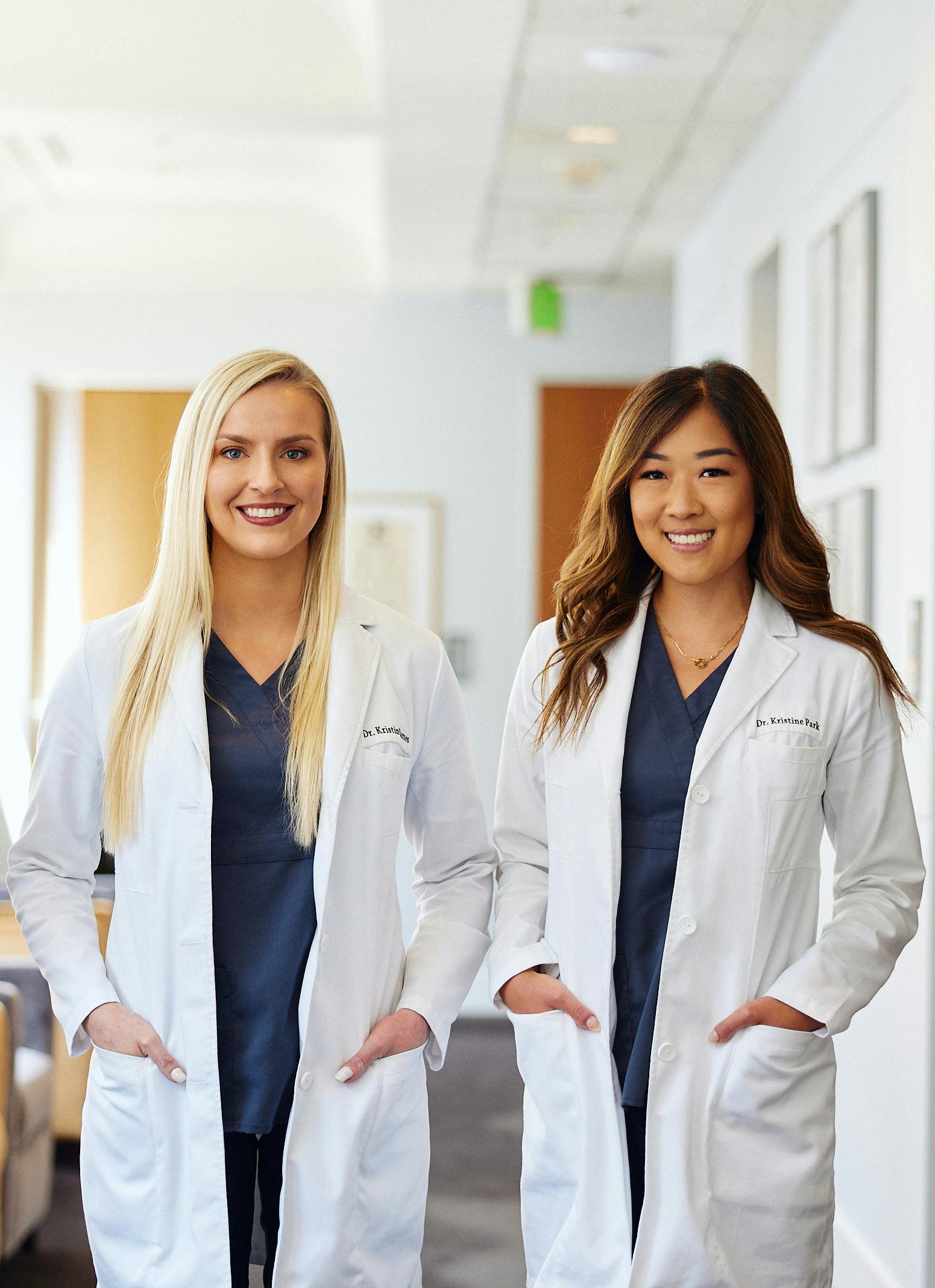 women in white lab coats