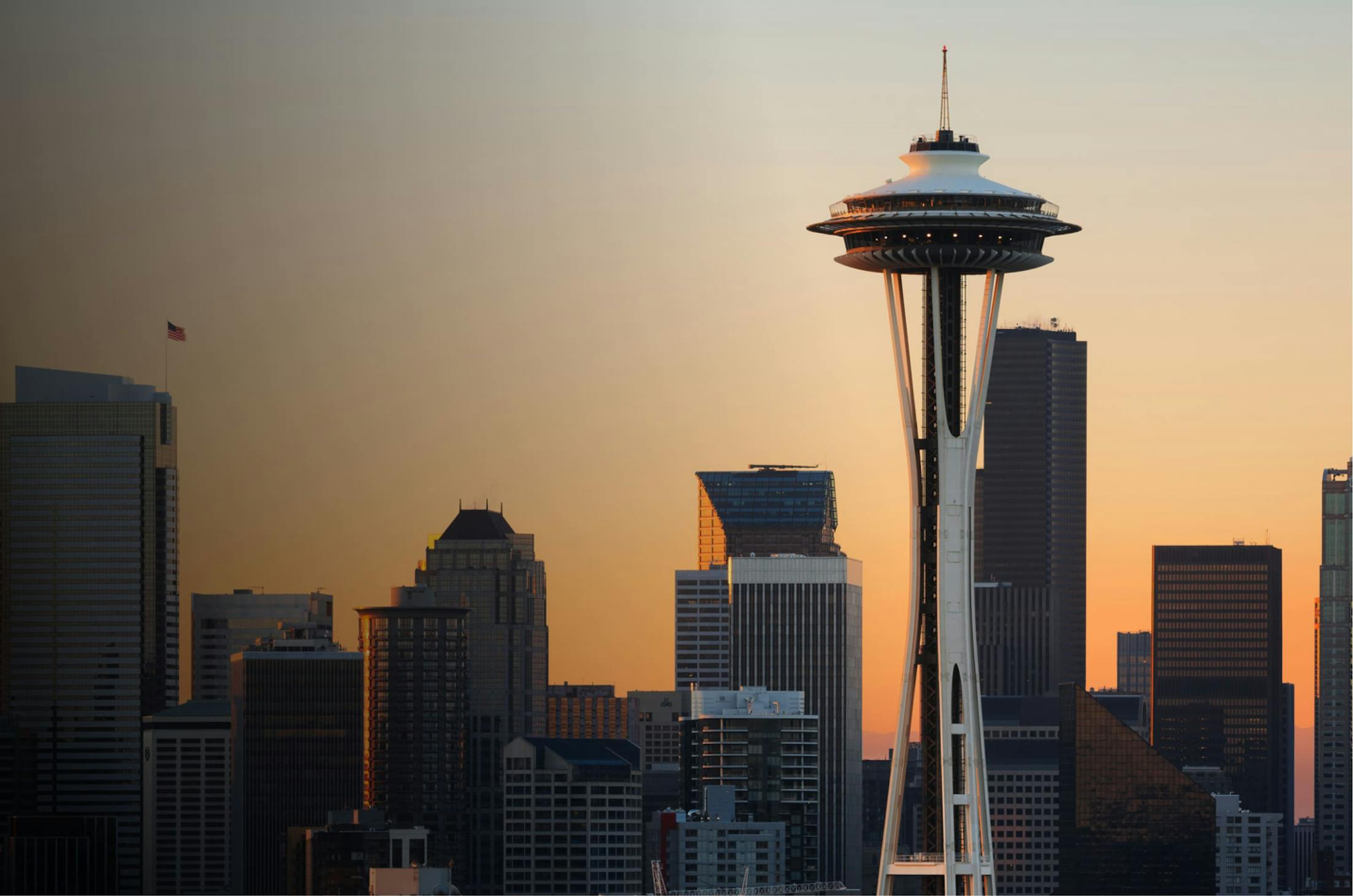 Space needle in the background of a city skyline
