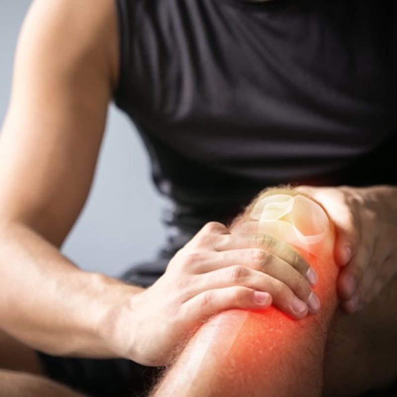 man with a painful knee and a sore