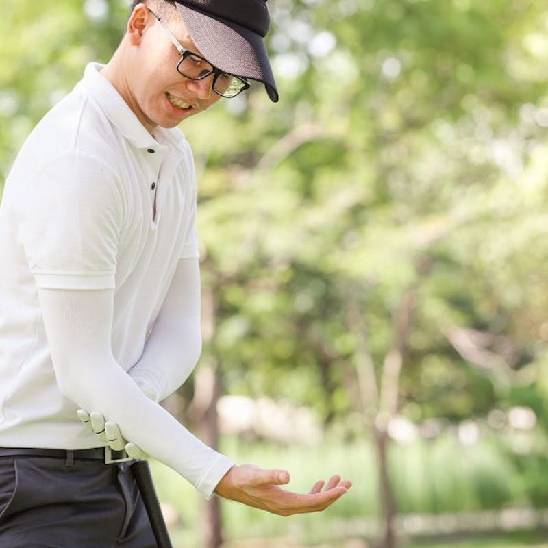 man experiencing arm pain