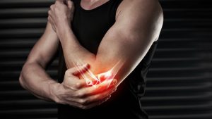 man with elbow pain