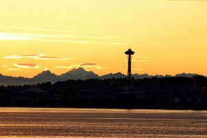 Space needle on skyline at sunset