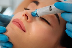 woman receiving Hydrafacial treatment