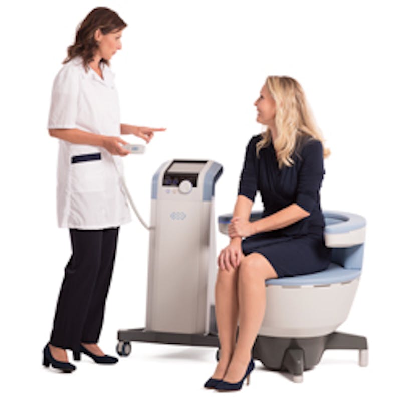 woman explaining machine to blond woman