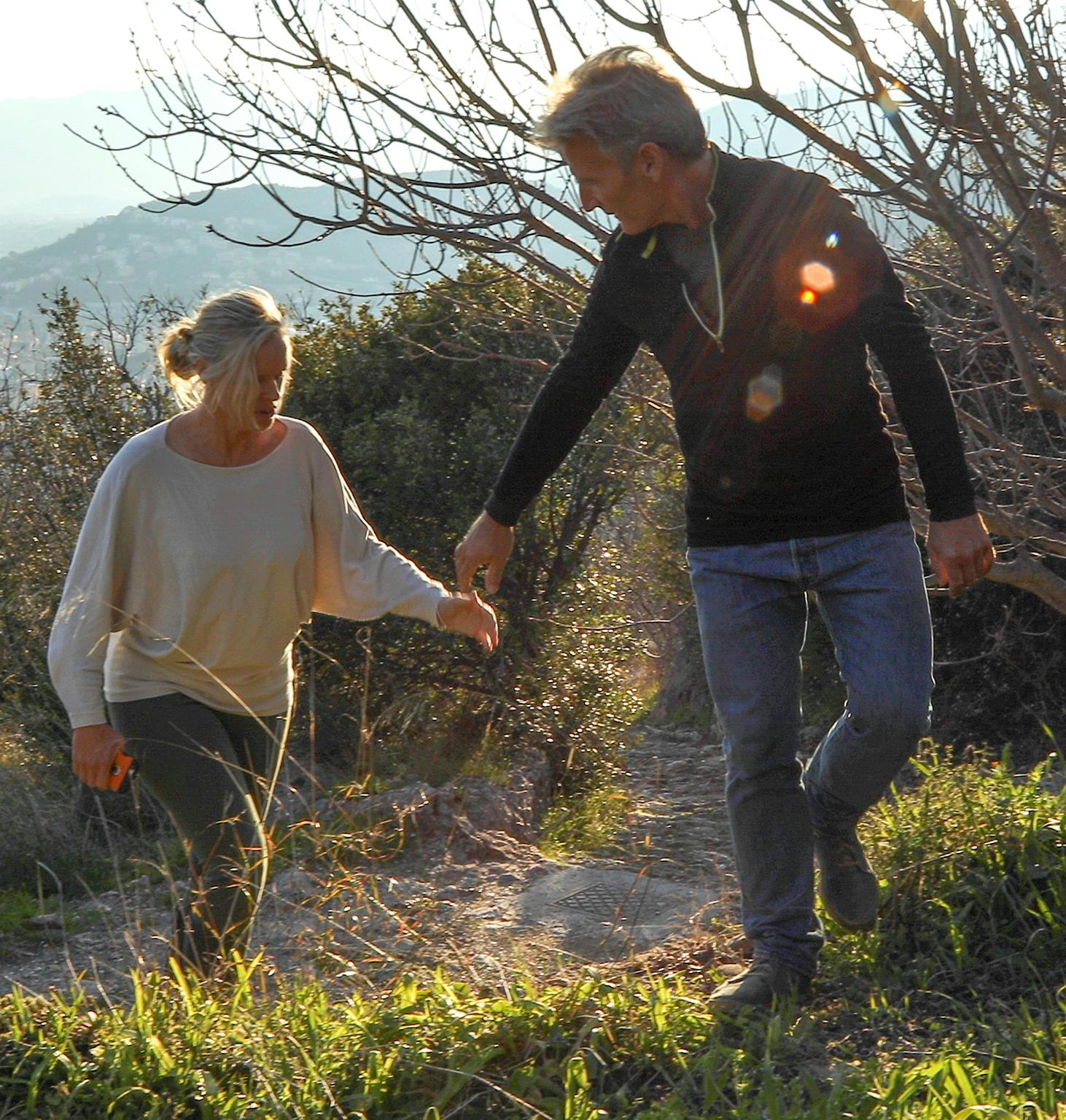 couple walking through trail