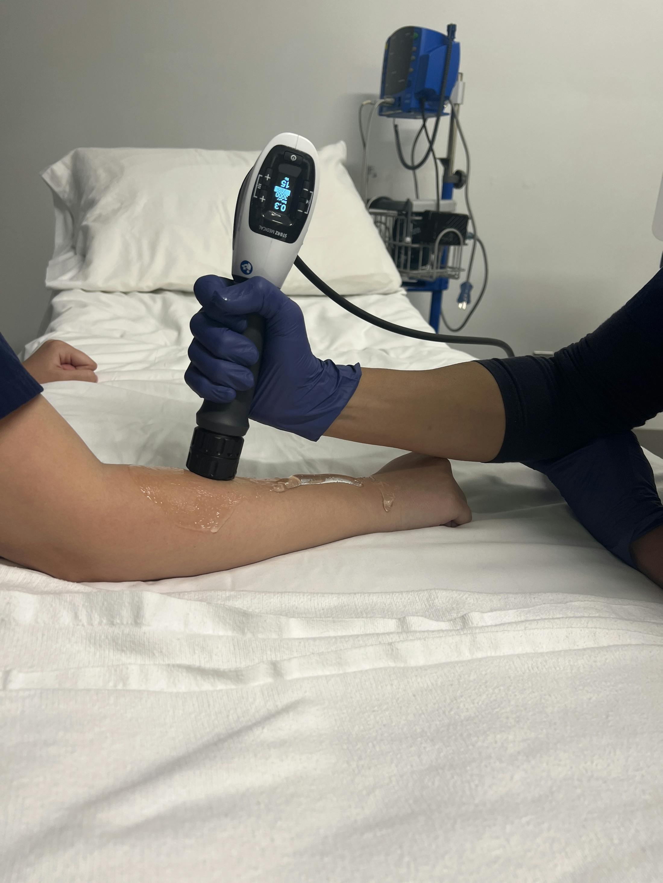 Person recieiving shockwave therapy