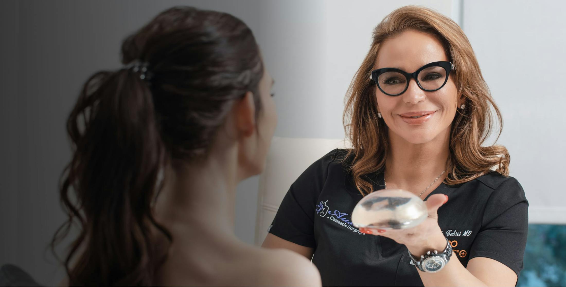 Dr. Cabret helping a woman with implants.