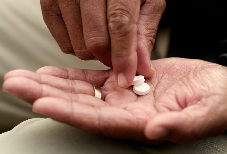 Person holding medication