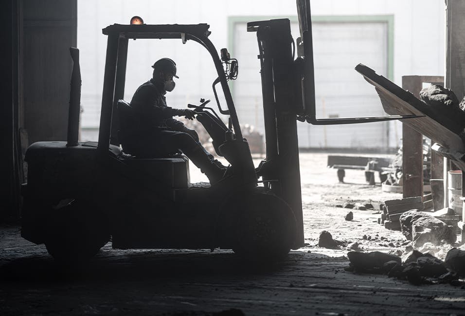 Man operating a forklift