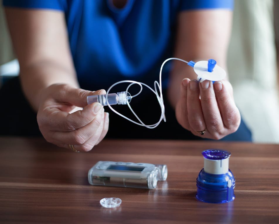 Person holding medical device