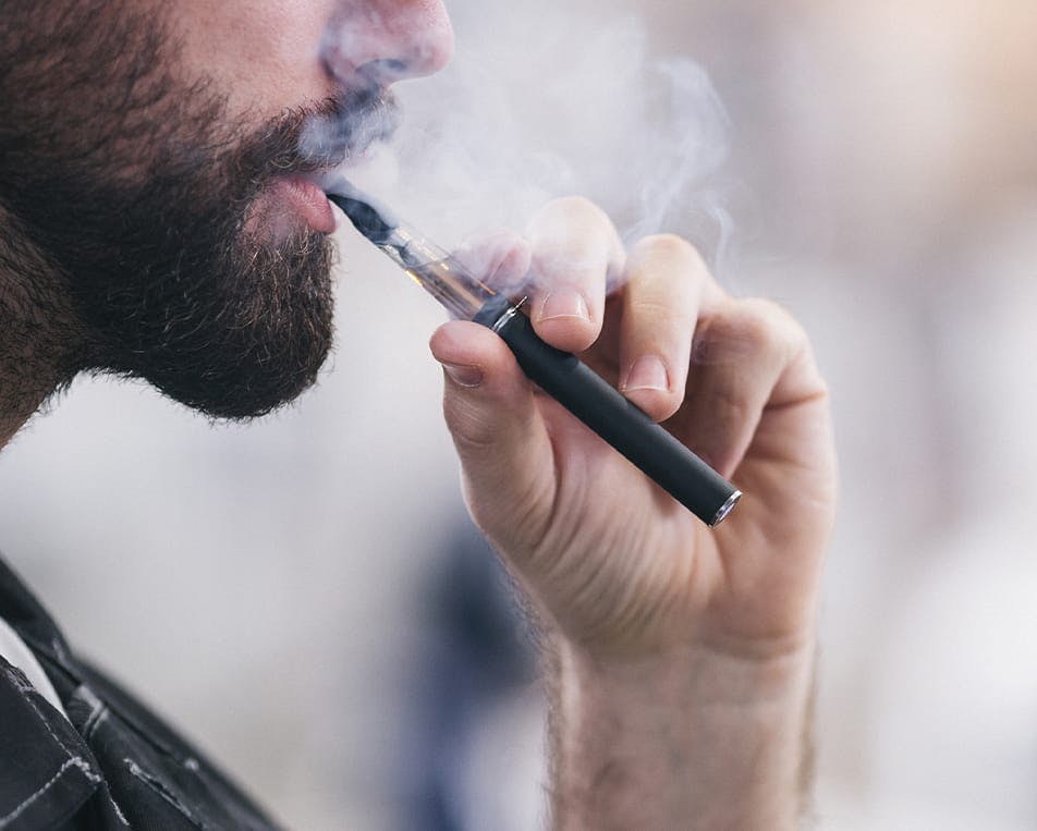 Man smoking e-cigarette