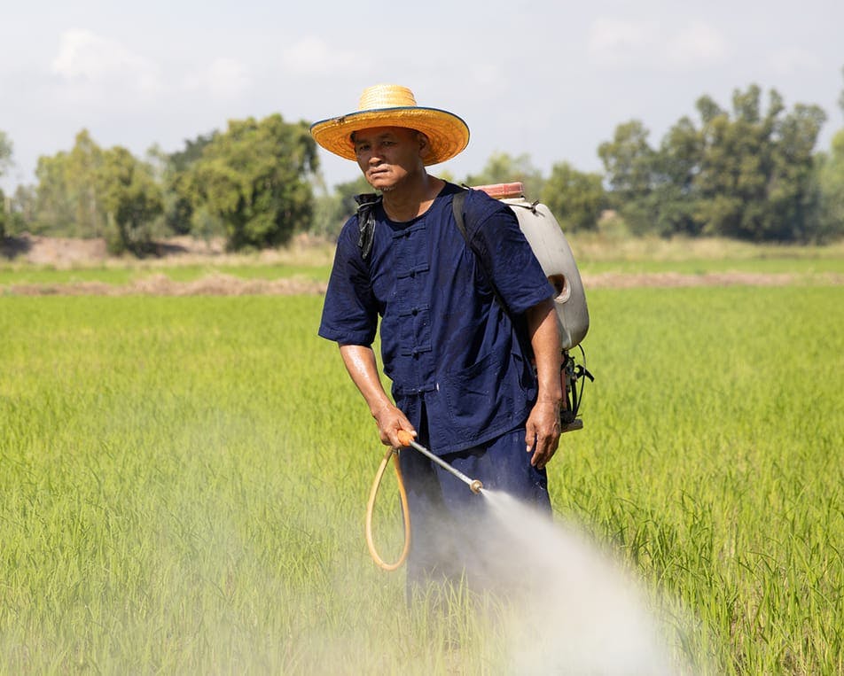 Farmer spraying herbicide