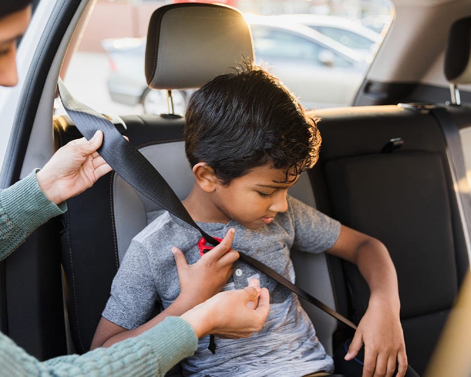 Child in a booster seat