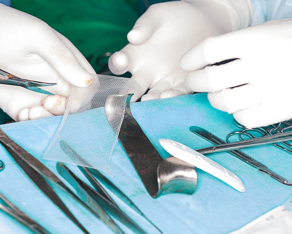 Healthcare workers using medical equipment