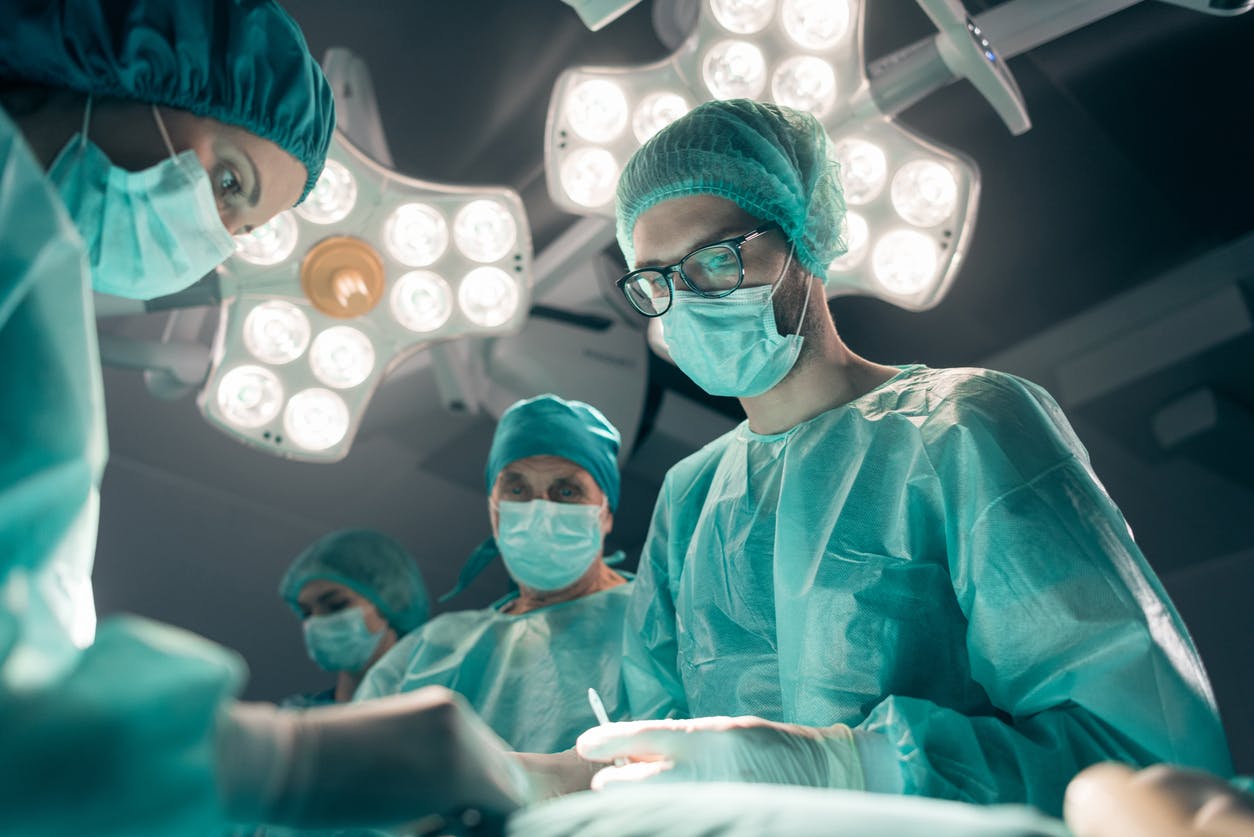 Looking up at doctors in a surgery room