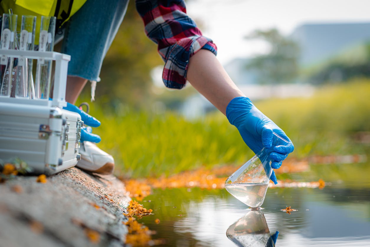 Person testing water quality