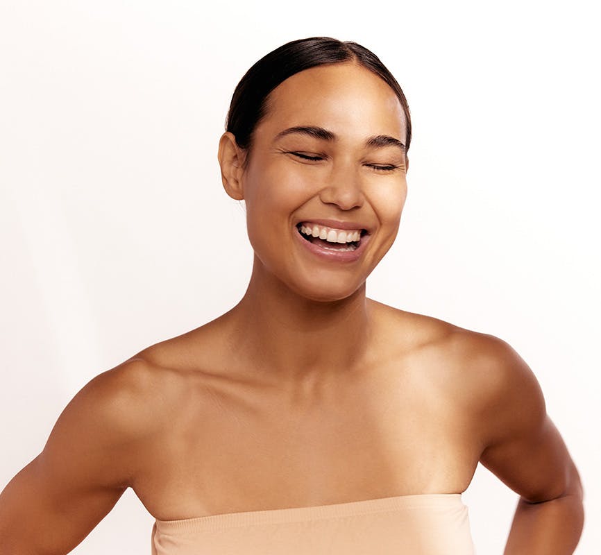 Woman Smiling and Showing Amazing Skin Tone