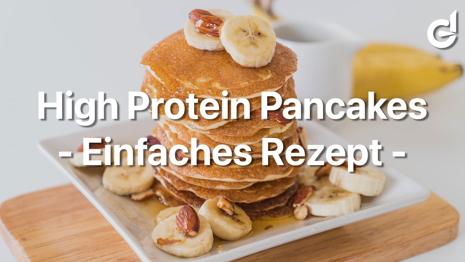 Die Überschrift des Artikels vor einem Bild mit Pancakes und Bananen auf einem Teller.