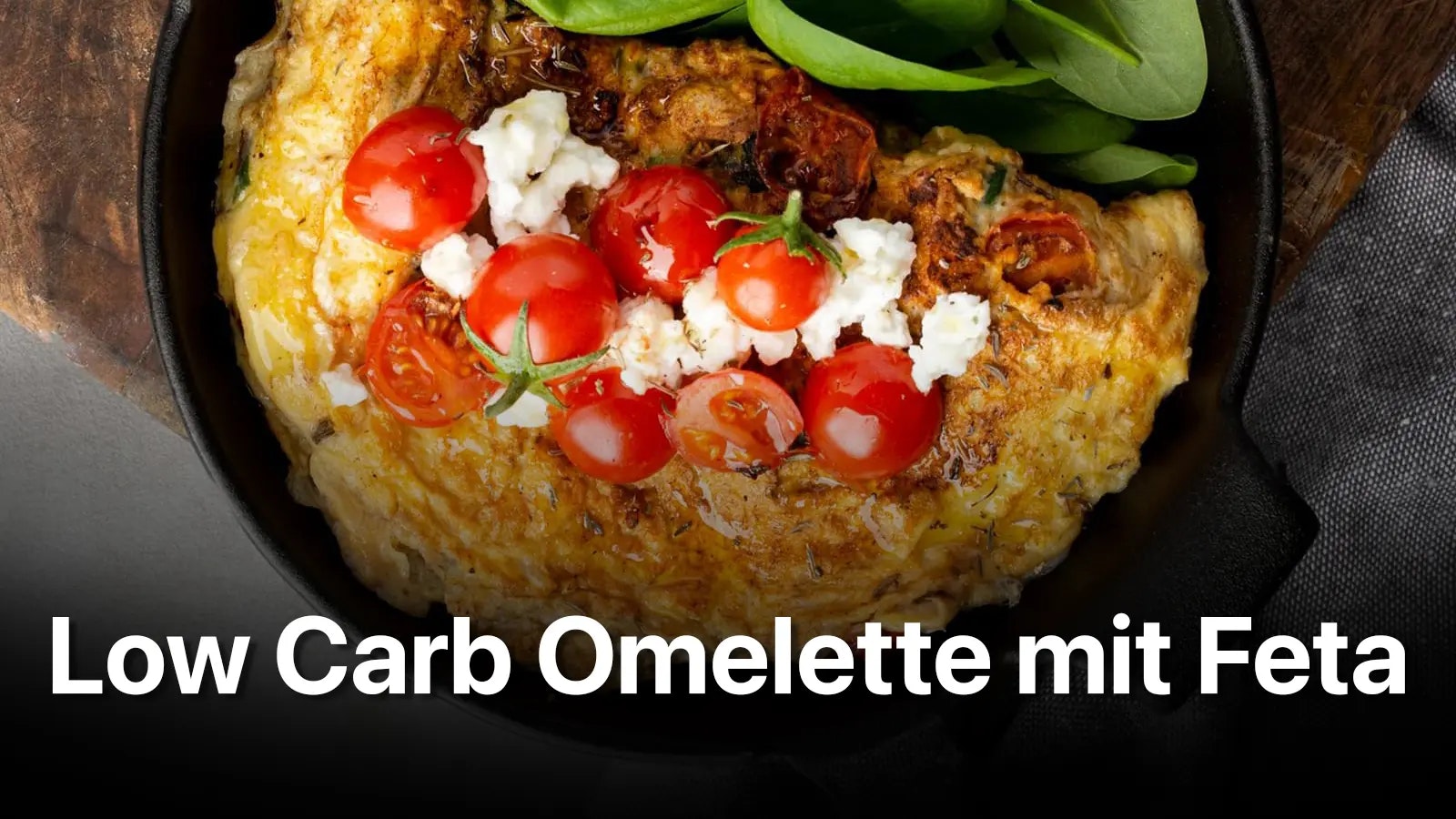 Der Titel des Rezepts und ein Omelette mit Tomaten und Feta in einer Pfanne.