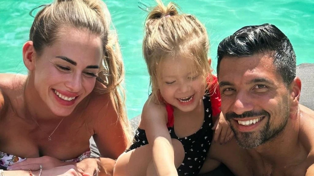 Foto von Julian Zietlow mit Alina und seiner Tochter.