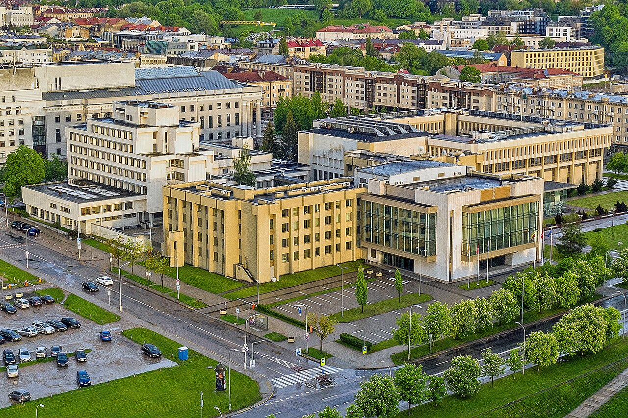 Top view of modernist buildings in the city of Vilnius, with green spaces surrounding them