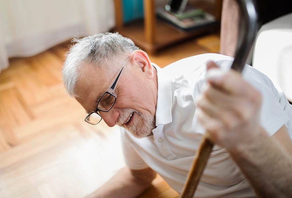 elderly man on the floor
