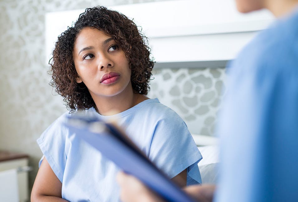 patient talking to a nurse