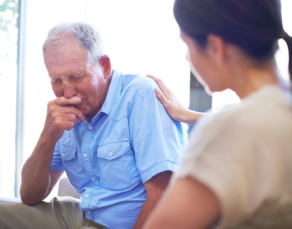 crying man next to woman