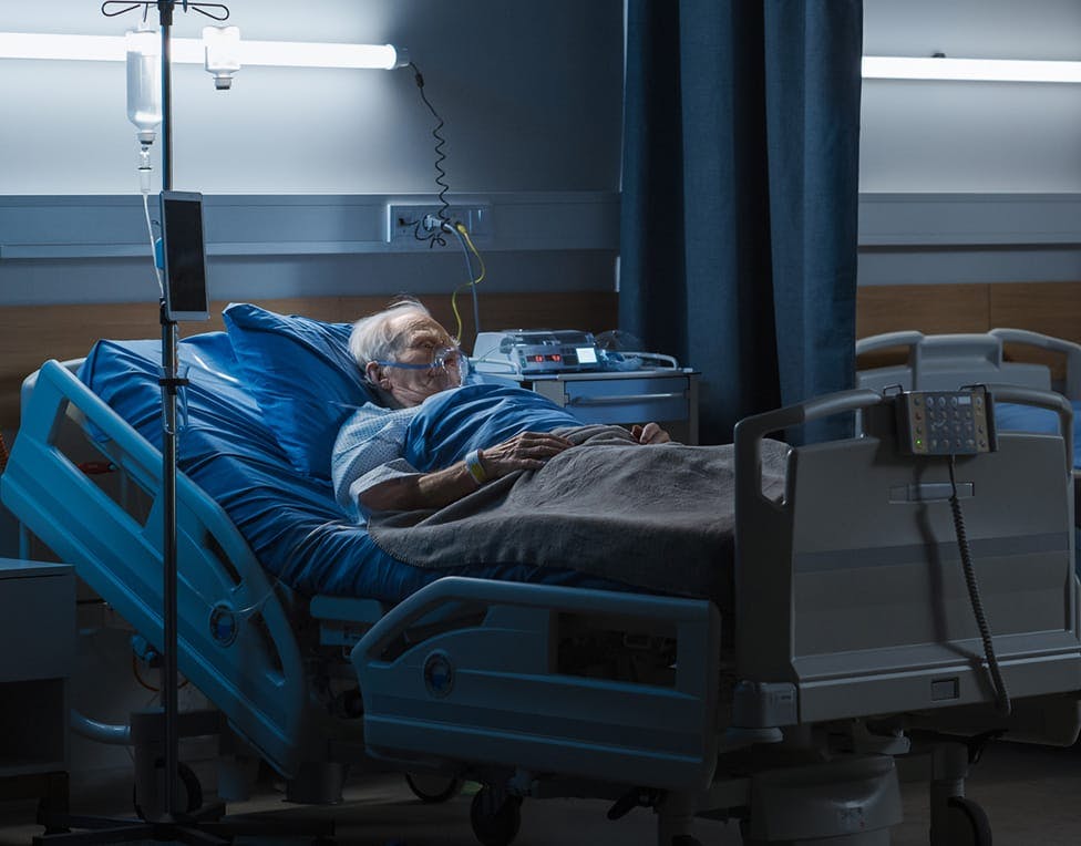 Man in a hospital bed