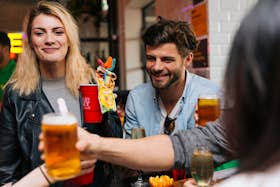 Group of friends having drinks together