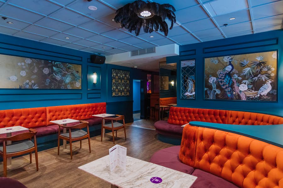 Booths for eating and drinking available at La Di Darts