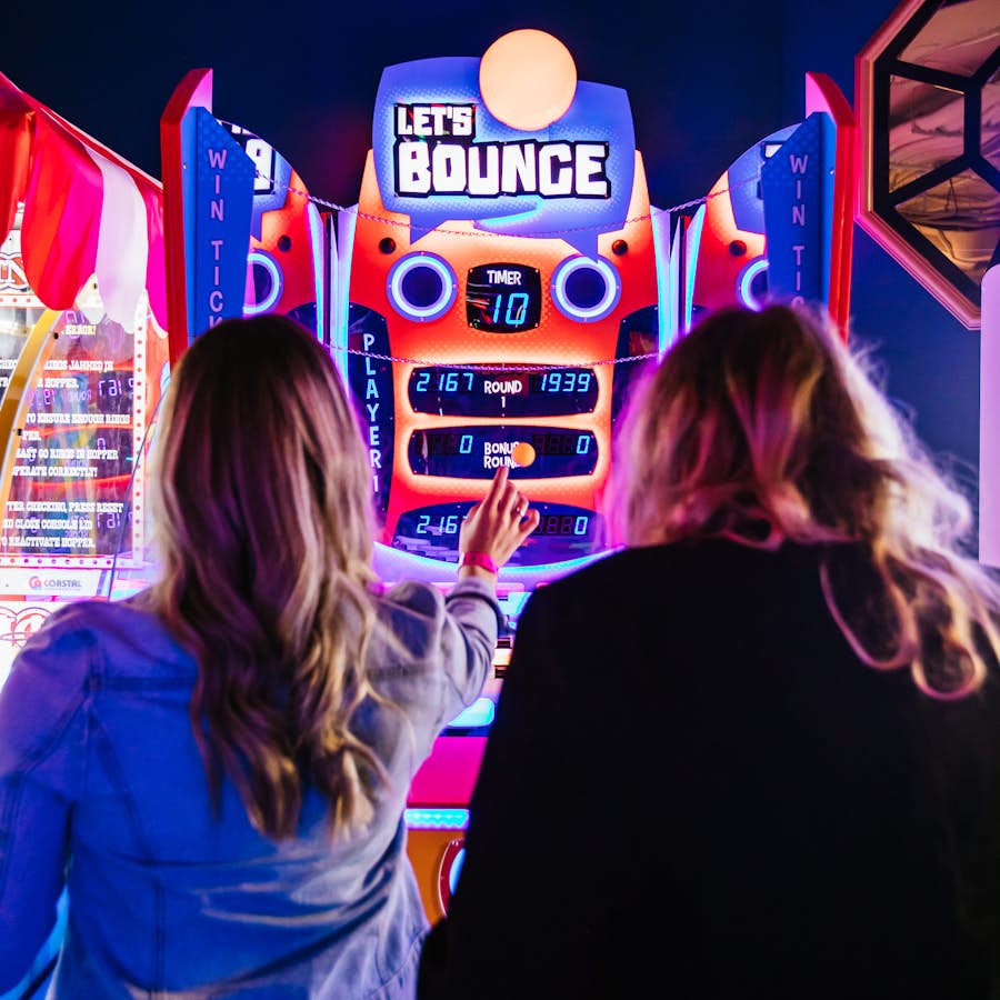 2 women playing lets bounce